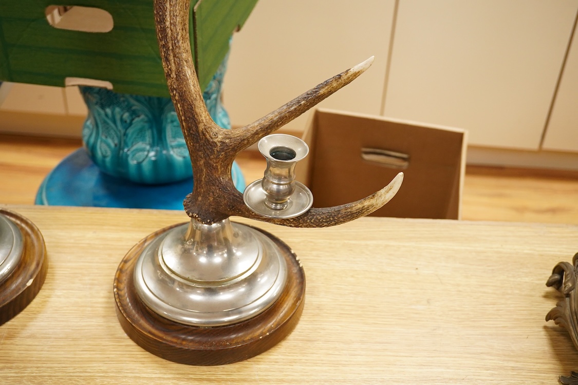 A pair of three light antler candlesticks, 67cm high